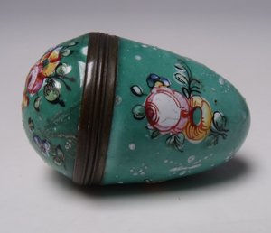 lot 67-AN 18TH CENTURY ENGLISH ENAMEL EGG SHAPED NUTMEG GRATER